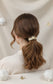 liga de cabello